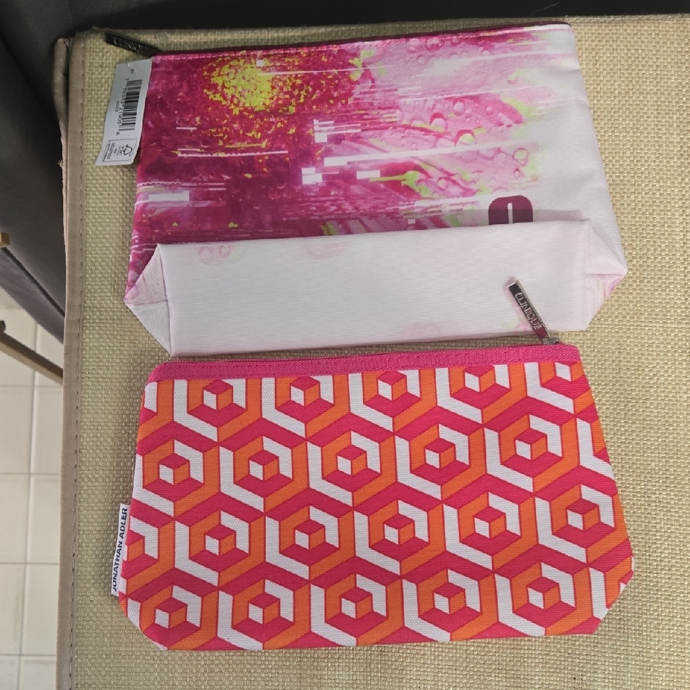 Clinique Pink and Orange Geometric Cosmetic Bags